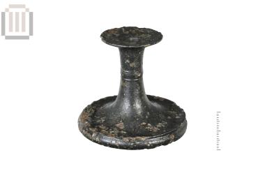 Στέλεχος χάλκινου αγγείου από το Δυμόκαστρο