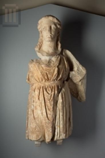 Part of a Dionysus Citharoedus statue from the west pediment of the Classical temple of Apollo
