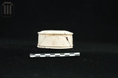 Small clay pyxis with lid