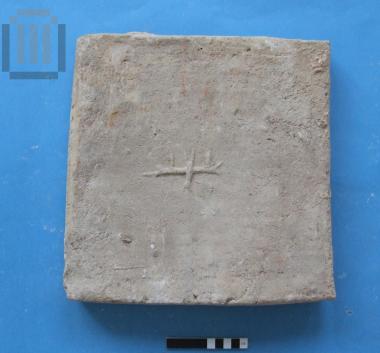 Stamped plinth with a cross and compilation