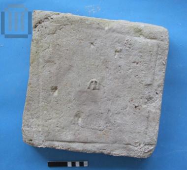 Stamped plinth with the letter 'E'