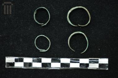 Four intact bronze rings