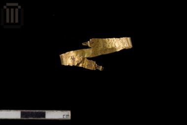 Thin band of golden sheet metal