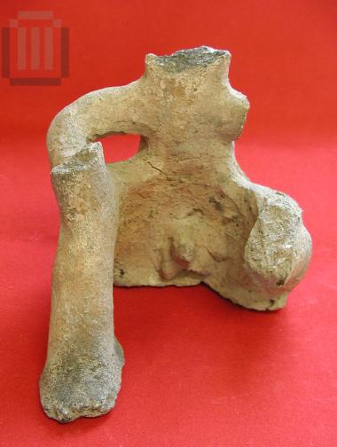 Seated male figurine