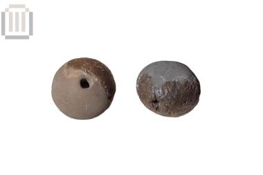 Parts of two small biconical spindle whorls