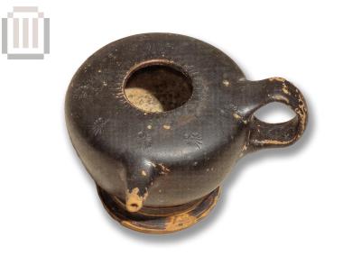 Black-glazed feeding bottle