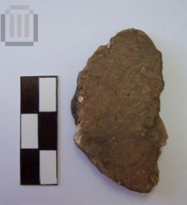 Fragment of  a round sherd disk