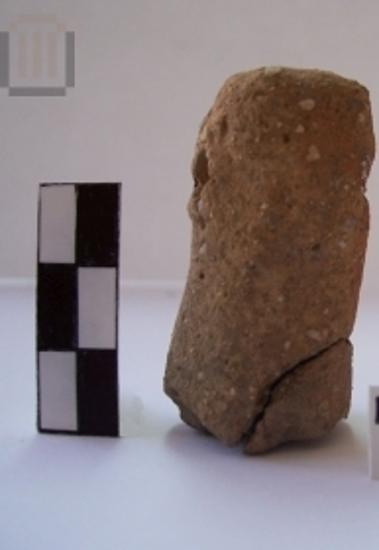 Fragment of a clay cylindrical object