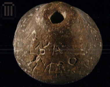 Inscribed spindle whorl