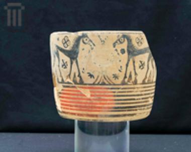 Cup decorated with confronted horses