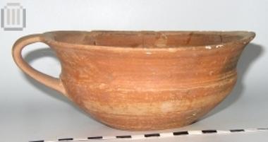 Red-glazed cup