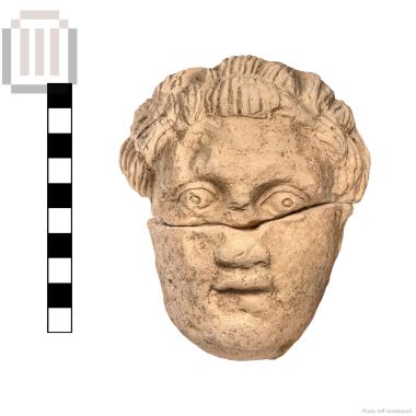 Clay male mask from Gitana