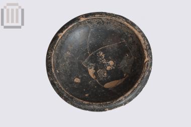 Clay black glazed handless napf from Pyrgos Ragiou