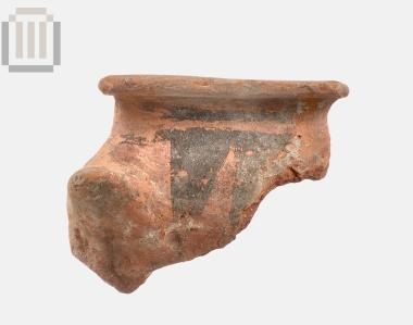 Τμήμα χείλους αγγείου αμαυρόχρωμης κεραμικής από τα Μαυρομαντίλια Προδρομίου