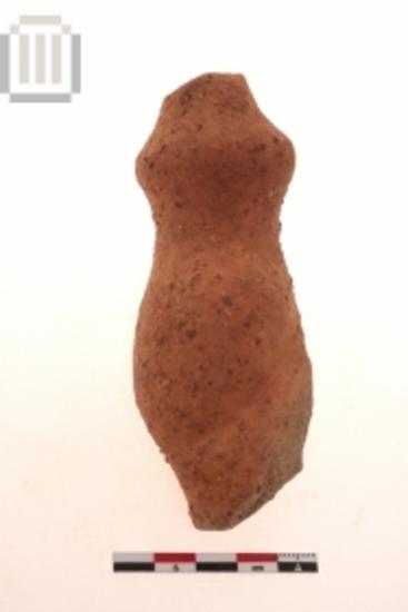 Part of female figurine