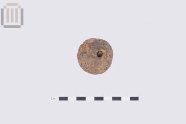 Clay spindle whorl from Dymokastro