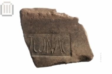 Part of an inscribed clay roof tile from the vicinity of Gitana