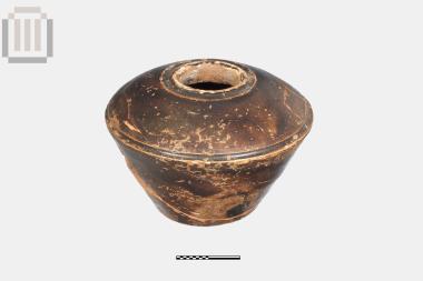 Clay black glazed inkpot from Gitana