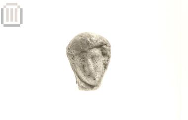 Head of a clay female figurine from Doliani