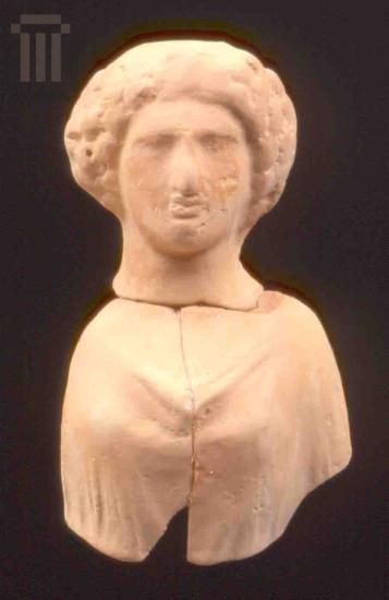 Part of a clay female figurine from Kyra Panagia