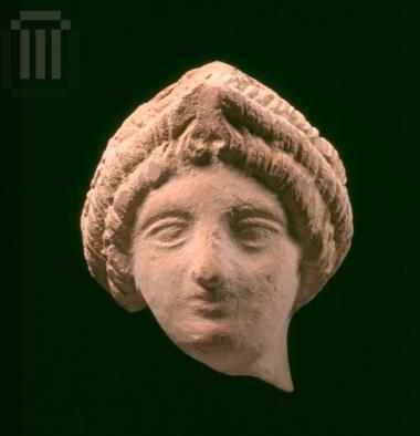 Head of clay female figurine from Kyra Panagia