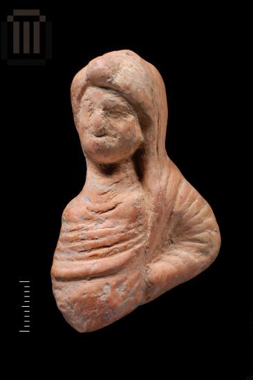 Part of a clay female figurine from Kyra Panagia