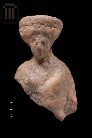 Part of a clay female figurine from Kyra Panagia