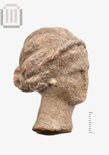 Head of a clay female figurine from Dymokastro