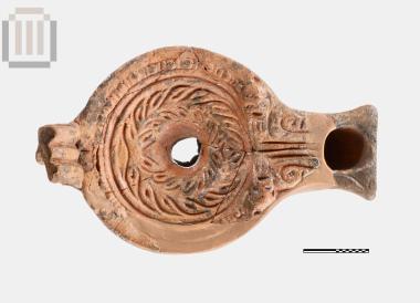 Clay red glazed lamp from Dymokastro