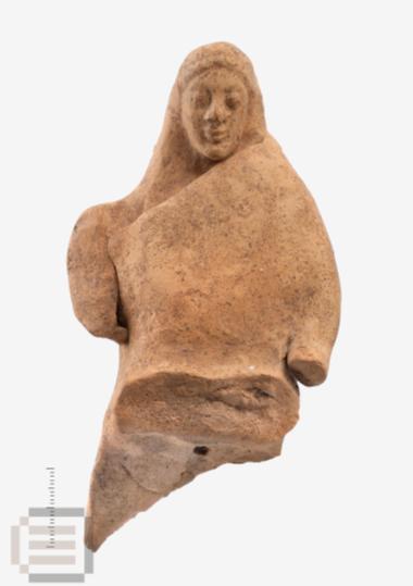 Clay-figurine of seated female from the Sanctuary of Nymphs - Koudounotrypa cave