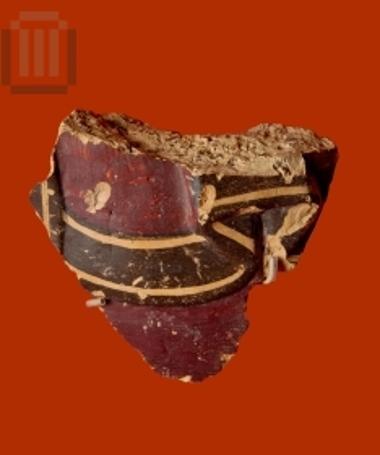 Fragment of a terracotta statuette 's dress