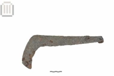 Iron scythe-shaped tool from Gitana