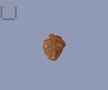 Heads of female clay-figurines