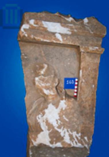 Part of a relief grave stele with pedimental crowning