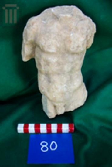 Headless male figure satuette