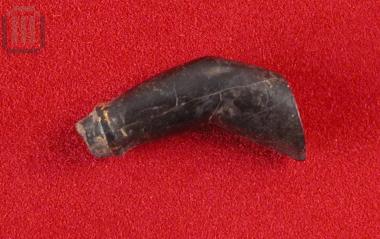 Ivory part of a hand of a female figure with a gilded bracelet from the decoration of a kline