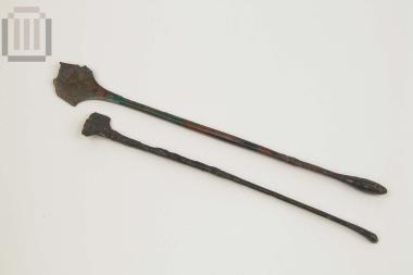 Two bronze spatulae for cosmetics or medicinal preparations