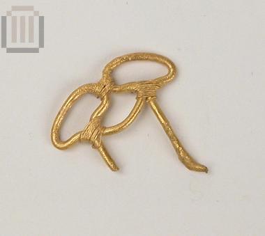 Part of a gold double pin