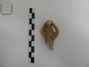 Clay mourner figurine