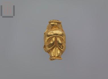 Gold bead in the shape of Heracles' knot