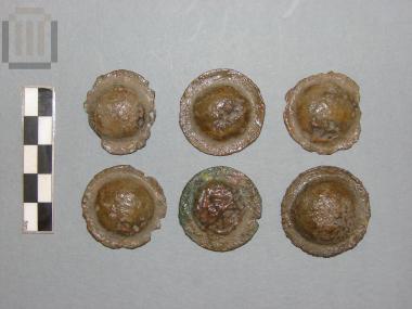 Six gilded bronze bosses from a wooden chest