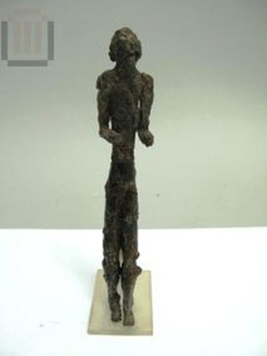 Iron kouros figurine