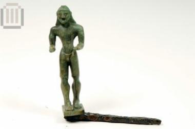 Bronze kouros figurine