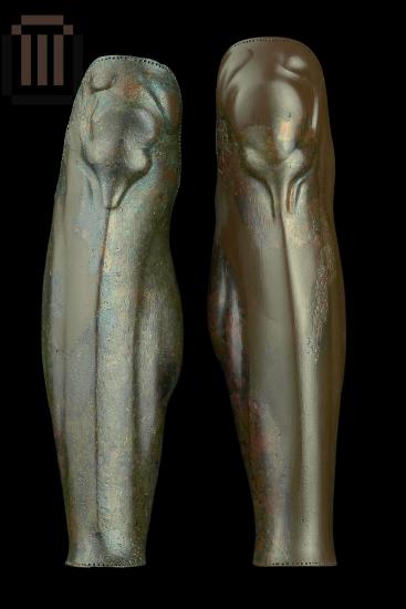 A pair of bronze greaves