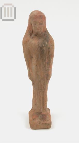 Terracotta figurine of a dressed male figure