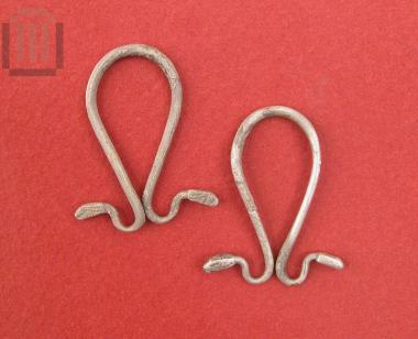 Two omega shaped earrings