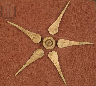 Ivory five-petal rosette from the decoration of a small chest