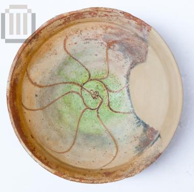 Large pottery bowl with incised decoration