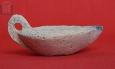 Clay inscribed round lamp