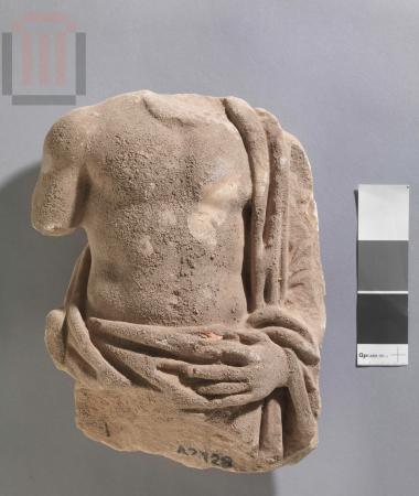Part of statue of male figure